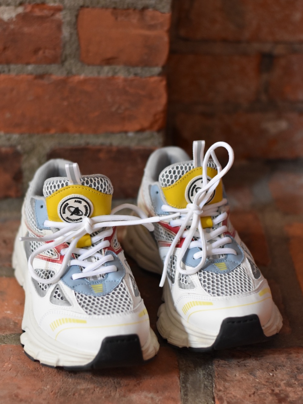 Axel Arigato White Sneakers with Yellow, Blue & Red Accents